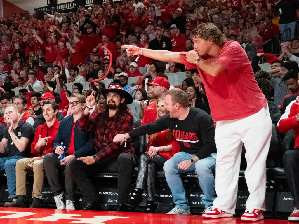 Landon Goesling (far right) is a former player turned NIL guru who knows Kelvin Sampson's UH program is special. (Photo by F. Carter Smith)