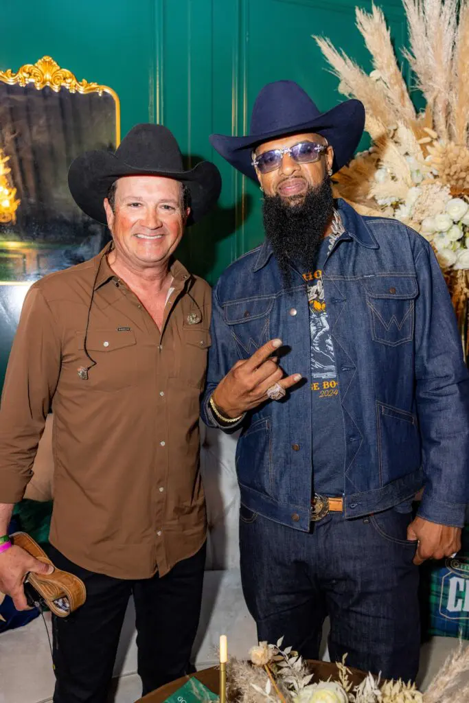 Country music artist Tracy Byrd with rapper Slim Thug in the Gold Pony VIP Lounge at the Cotton 'Q Club at RodeoHouston. (Photo courtesy of Cotton Holdings Inc.)