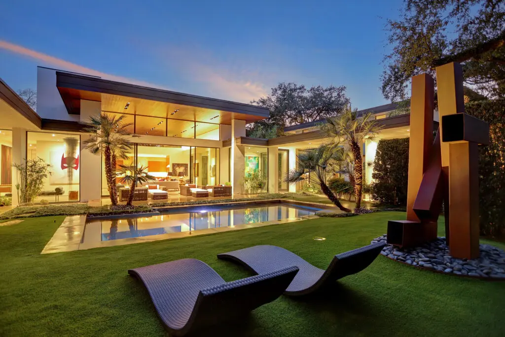 Nestled on the only double lot in the coveted neighborhood of Highland Village, the contemporary, luxury estate of 4011 Essex Lane is no ordinary Houston home.
