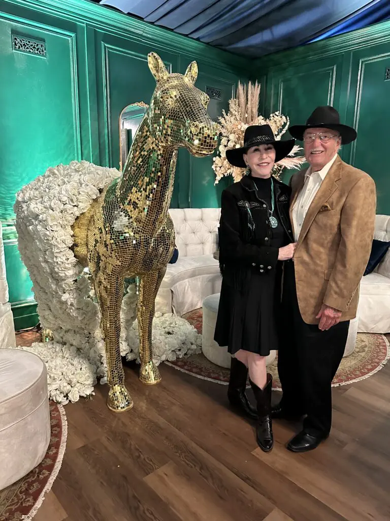 Shelby Hodge & Shafik Rifaat in the Cotton 'Q Club VIP Golden Pony Lounge during the RodeoHouston barbecue cookoff. (Photo courtesy of Cotton Holdings Inc.)