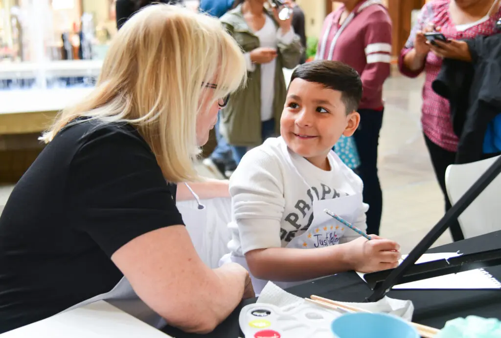 A Children's Cancer Fund shopping experience. (Photo by Grant Miller Photography)