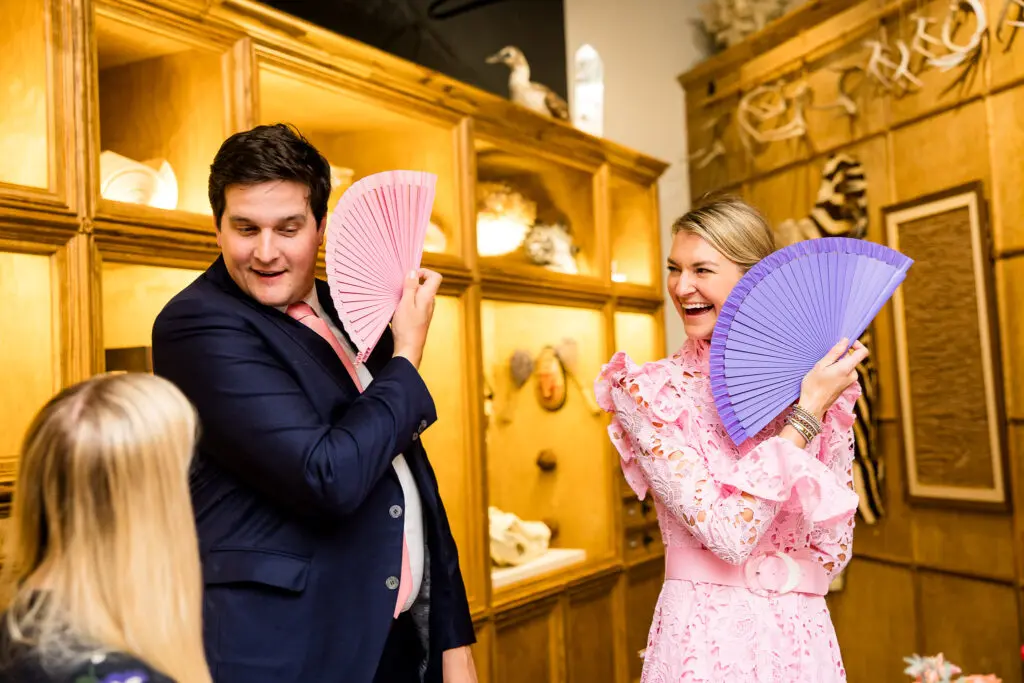 John & Lindsey Hohlt  learn fan language at the Houston Museum of Natural Science H.P. Attwater Society event. (Photo by Hung L. Truong)