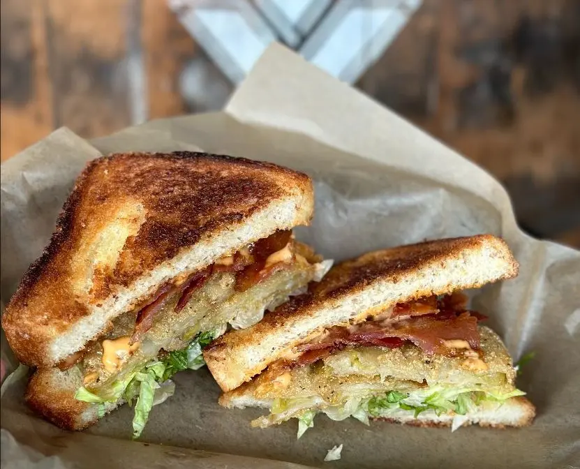The new lunch menu at JD's adds non burger options to the mix, like the BLT with Fried Green Tomatoes. (Courtesy)