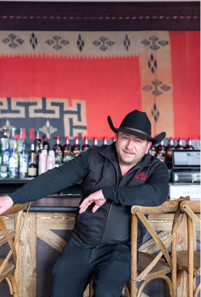 Ben Berg in western wear at The Ranch Steakhouse + Saloon. (Photo by Jenn Duncan)