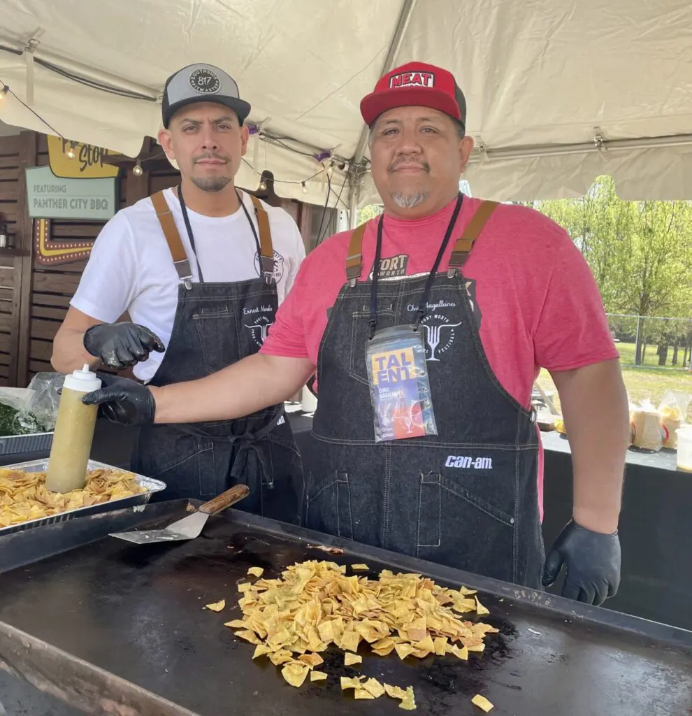 Panther City BBQ co-owners Chris Magallanes and Ernest Morales, shown cooking at the Fort Worth Food Festival, are taking over Bailey's. (Photo by Courtney Dabney)