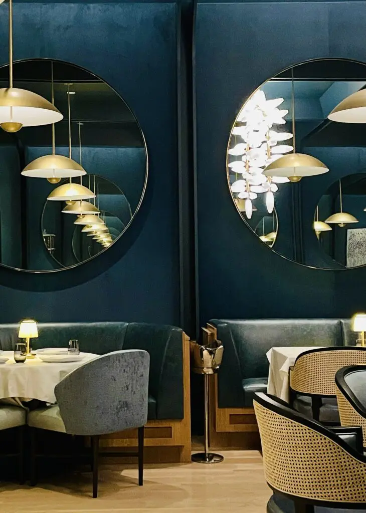 The Blue Room - Wrapped in blue fabric and surrounded by round mirrors, its and intimate dining experience. (Photo by Courtney Dabney)