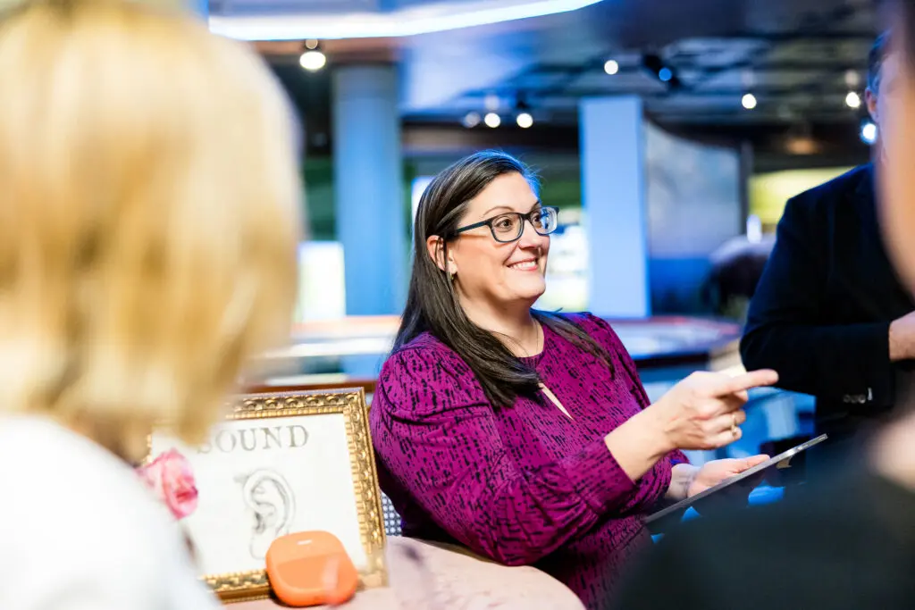 HMNS vice president of education Nicole Temple playing animal mating calls at the Houston Museum of Natural Science H.P. Attwater Society event. (Photo by Hung L. Truong)