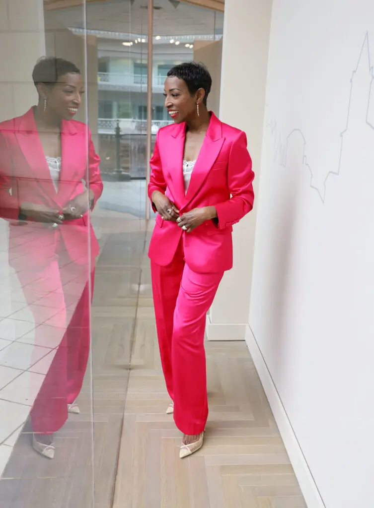 This A.L.C. pink jacket with matching pink pants and Malone Souliers gold pumps make a statement.