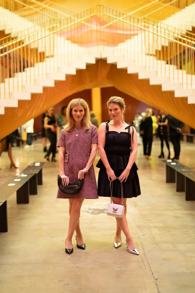 Fashionable twins at the Louis Vuitton 2024 Spring/Summer collection presented in the X Atrium at POST Houston. (Courtesy Louis Vuitton; Image Megan Kay Photography)