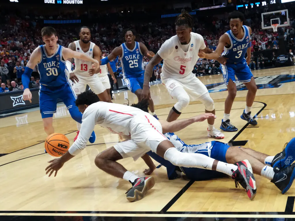 Mylik Wilson dove for the basketball. That's what University of Houston players do. (Photo by F. Carter Smith)
