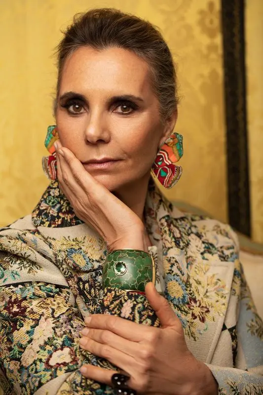 Silvia Furmanovich wearing Sculptural Botanical marquetry rainbow butterfly earrings.