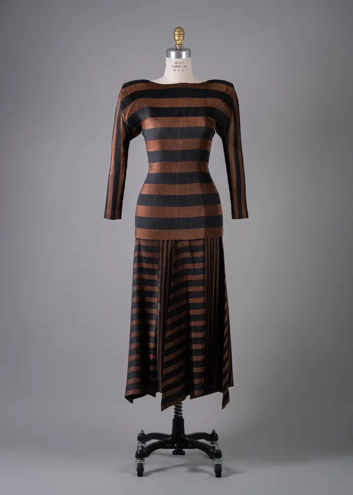 Issey Miyake's brown and black striped polyester skirt ensemble (Photo by Shane Quereshi)