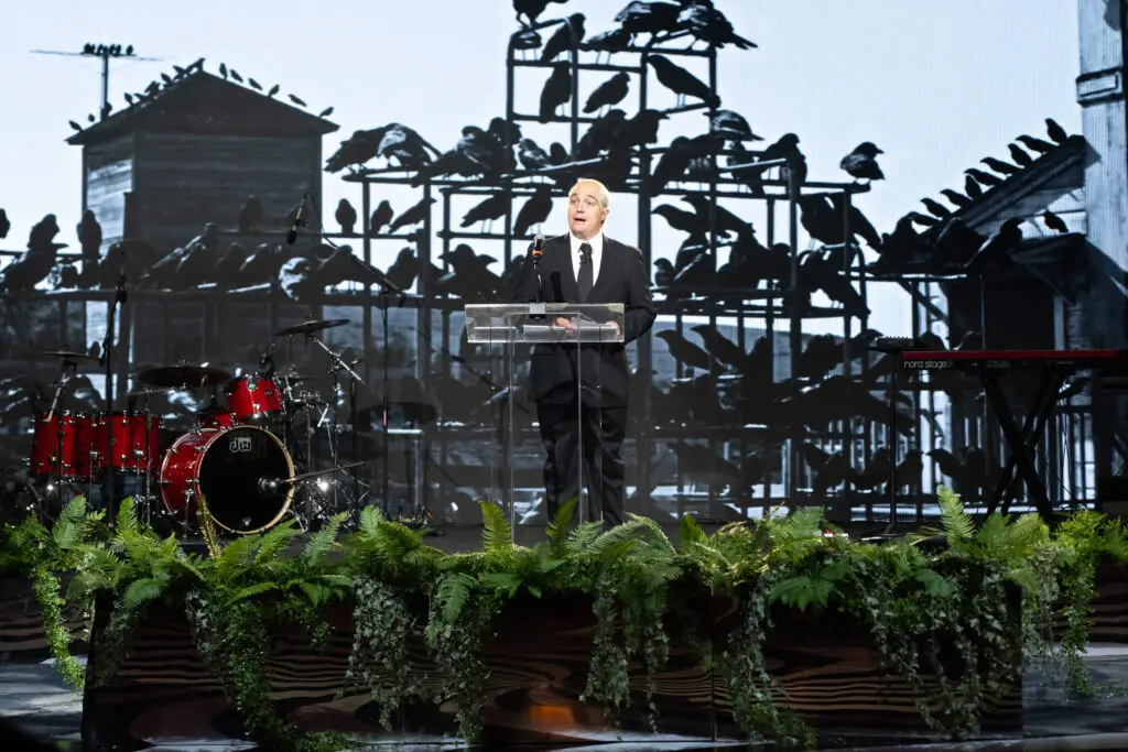 Alley Theatre Resident Company Member Chris Salazar emceed the night as Alfred Hitchcock. (Photo by Wilson Parish)
