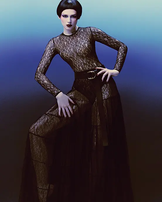 Michael Kors Collection crewneck bodysuit $890, ruffle five-tiered skirt $2,690, knit brief $390, Jackie double ring belt $490, and T-strap sandal $690 at Neiman Marcus. 