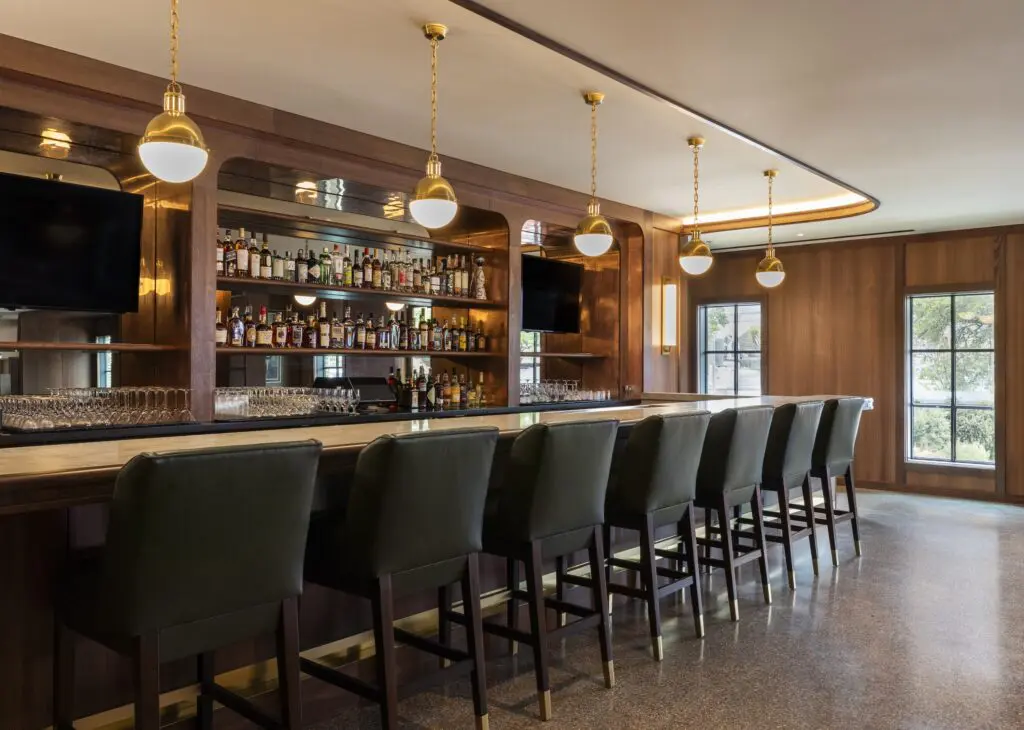At Bar Bludorn, one side of the room is anchored by the bustling bar, while on the opposite side, the gleaming stainless steel kitchen gives diners seated in the center of the action a view of what chef Alexandra “Allie” Peña and her team are cooking up. (Photo by Claudia Casbarian)
