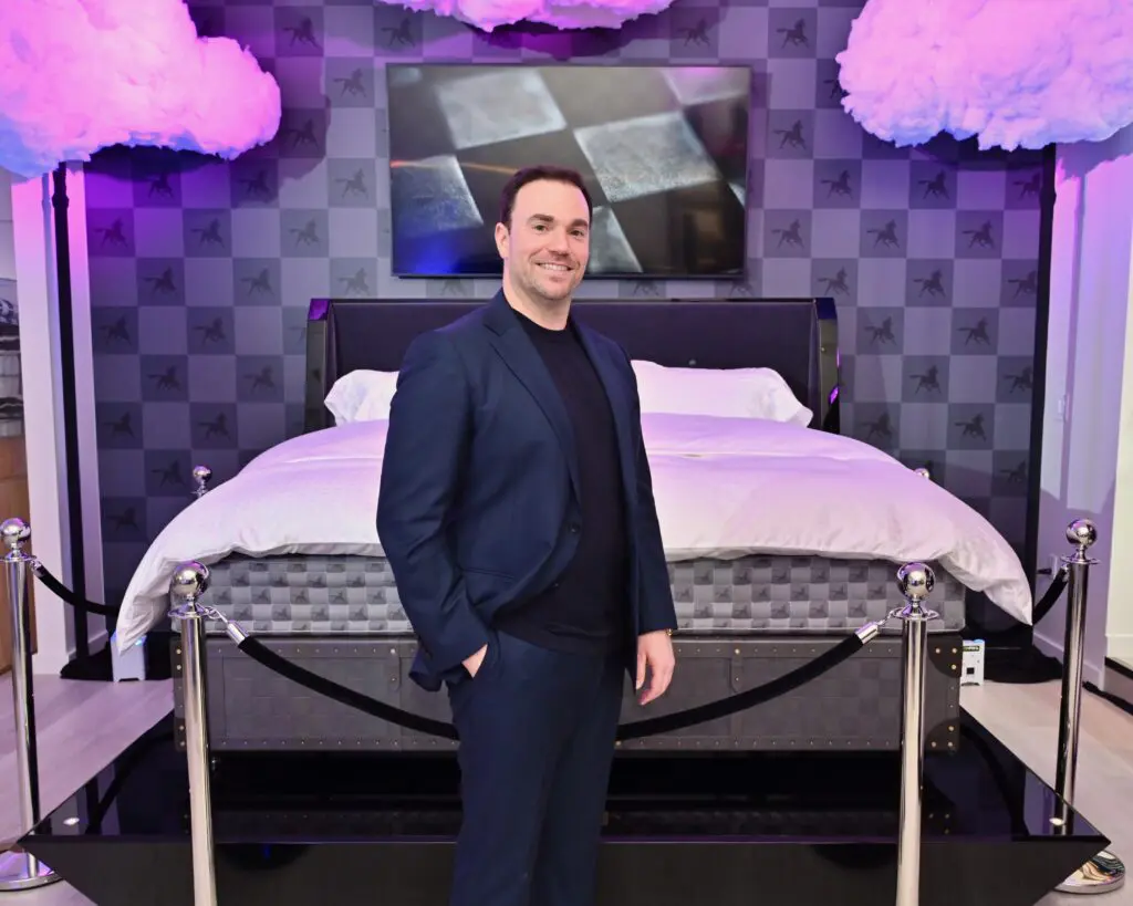 Bradley Belen, managing director of Hästens for MadaLuxe Group, with the Grand Vividus in the River Oaks District showroom. (Photo by Alex Montoya)