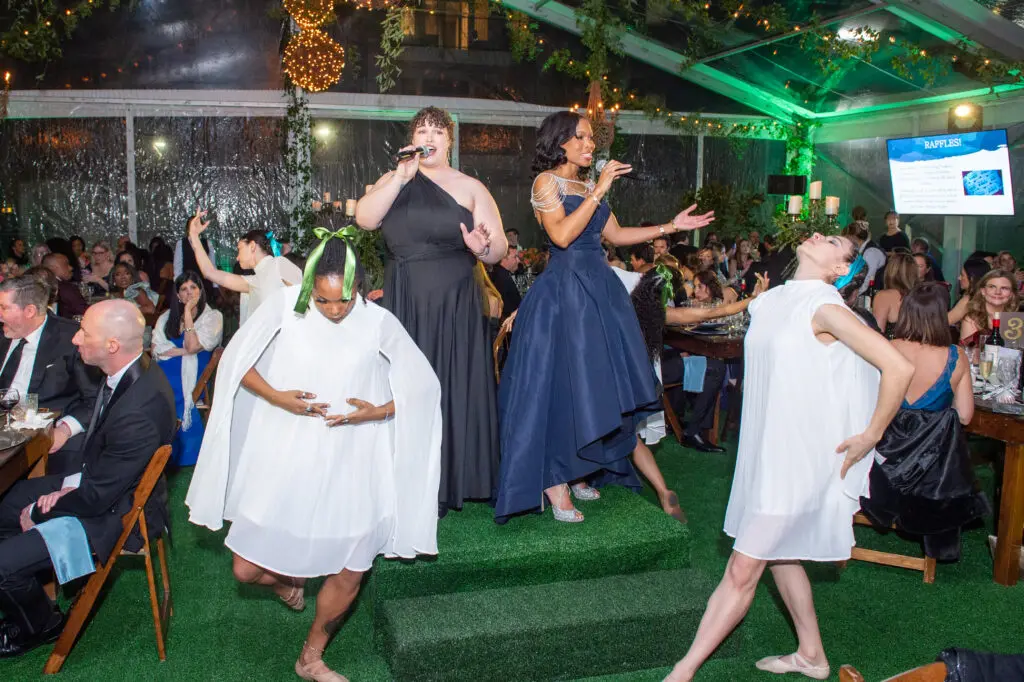 Kaitlyn Stuart and Roslyn Bazzelle-Mitchell perform with the Lockin Keez Dance Company at the Junior League of Houston Charity Ball. (Photo by Jacob Power)