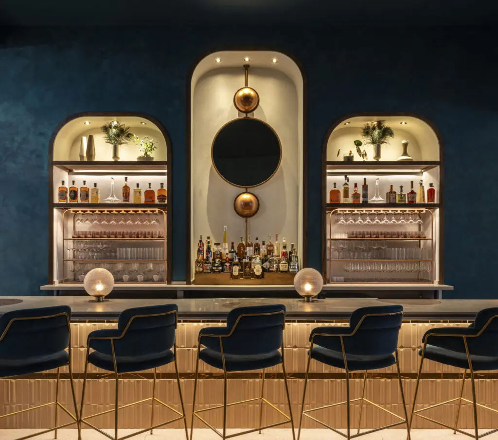 The striking marble-topped bar designed by Gin Design Group beckons at the new restaurant Late August at The Ion on Main Street. (Photo by Leonid Furmansky)
