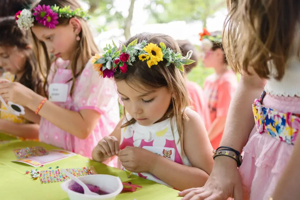 Youngsters enjoying crafts at the Ambassadors for Texas Children’s Hospital Family Fun Day (Photo by Johnny Than)