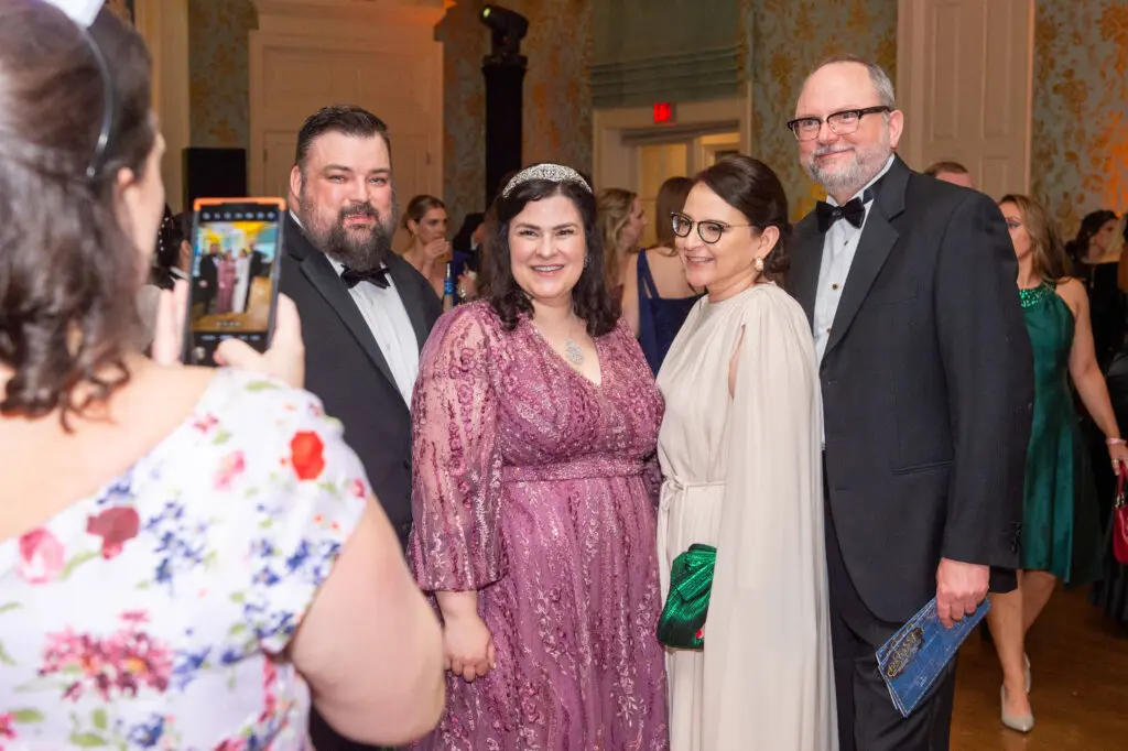 Michael Bayles & Junior League of Houston president Amanda Hanks 
Bayles, Sarah Aguirre, Troy Williams at the Charity Ball (Photo by Jacob Power)