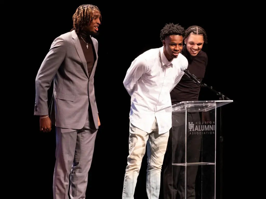University of Houston basketball players Ja'Vier Francis, Terrance Arceneaux and Emanuel Sharp introduced Kelvin and Karen Sampson at the UH Alumni Awards.  (Photo by F. Carter Smith)
