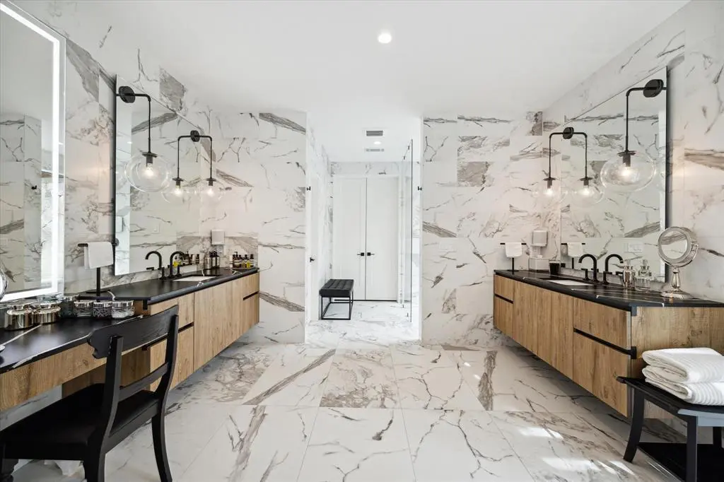 The marble master en-suite spa bathroom is ideal for self care days. (Photo by TK Images)