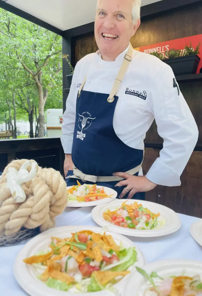 Chef Jon Bonnell served a crab and shrimp salad to Water's fans. (Photo by Courtney Dabney)