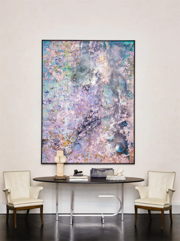 Slate-and-steel table by Marino di Teana. Vintage Frits Henningsen chairs in Jerry Pair leather. Frank Bowling canvas. (Photo by Eric Piasecki)