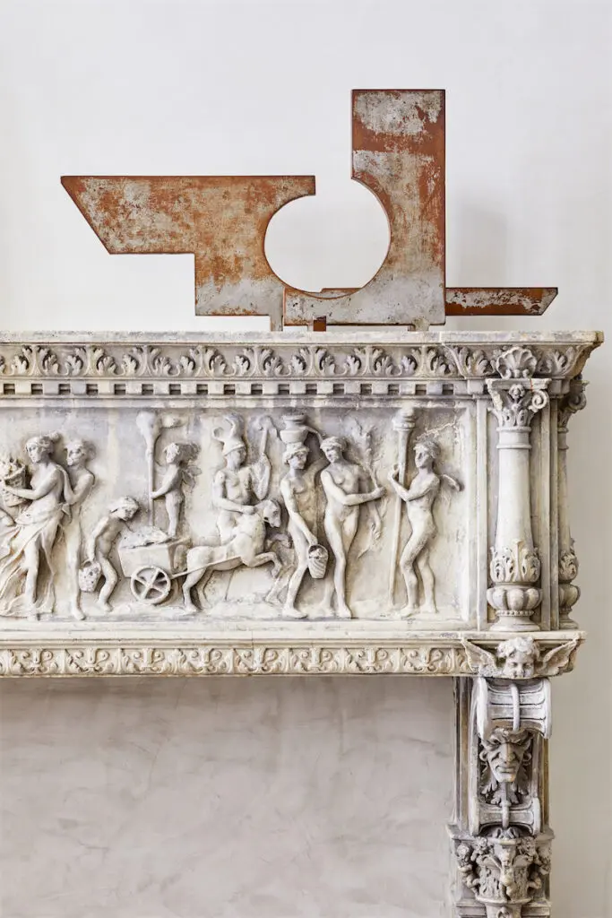 Marino di Teana sculpture atop antique Neoclassical marble fireplace. (Photo by Eric Piasecki)