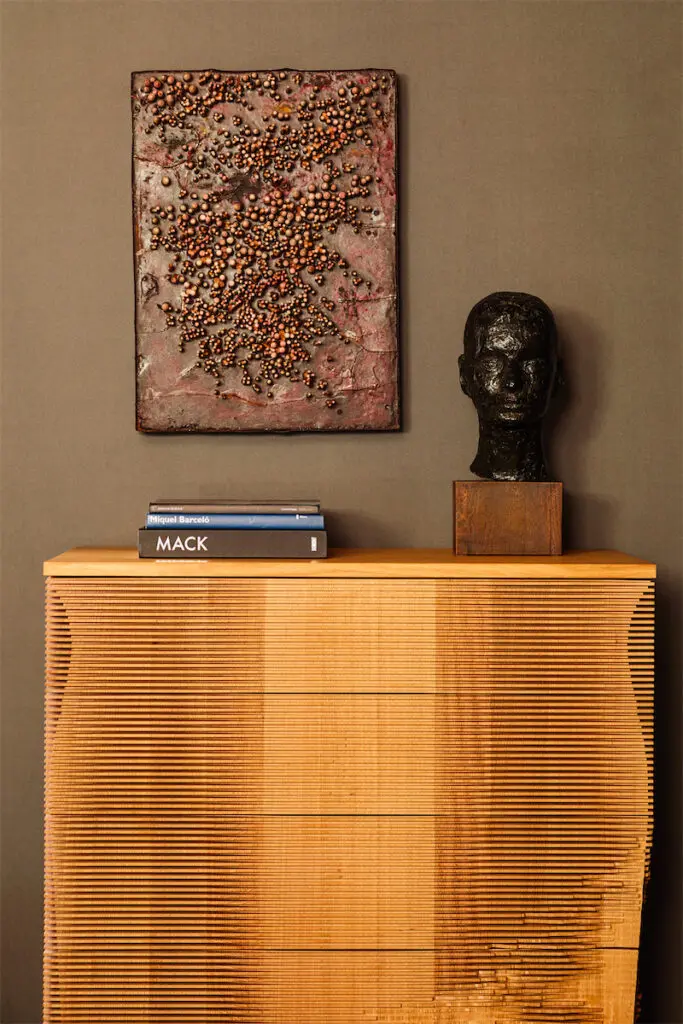Gareth Neal cabinet. Zoltán Kemény artwork. André Arbus bust. (Photo by Eric Piasecki)