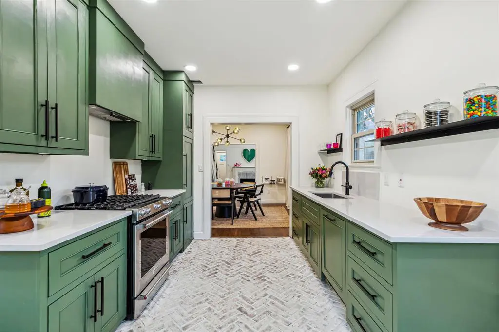 Herringbone-laid brick lines the kitchen. 