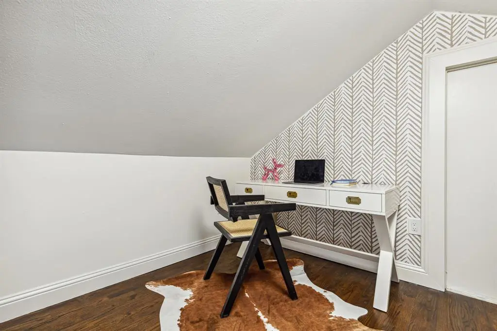 The upstairs loft doubles as an office. 