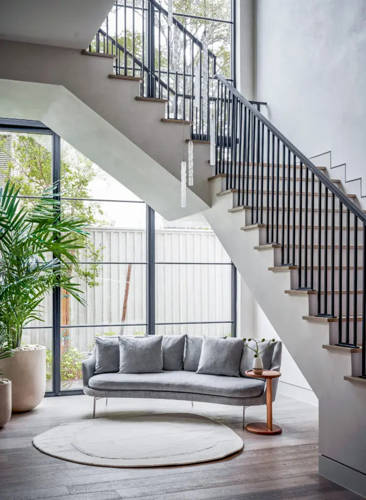 The architectural staircase in the Villanova Homes new-build at 2110 Del Monte. (Photo by TK Images)