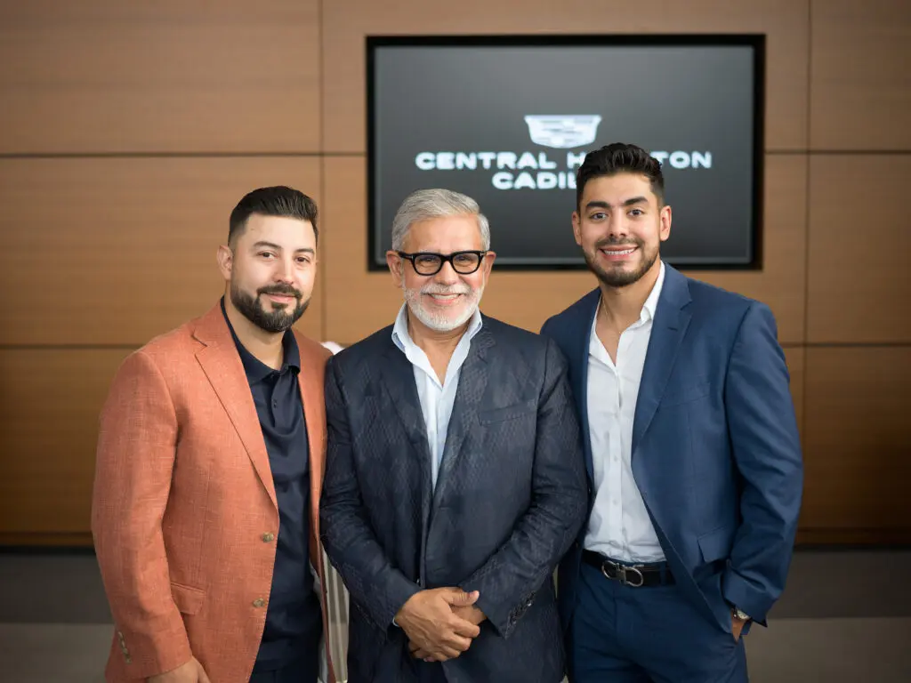 Carlos Sanchez, Juan Sanchez, Christian Sanchez at the grand opening of Central Houston Cadillac's new location near NRG Park (Photo by Daniel Ortiz)