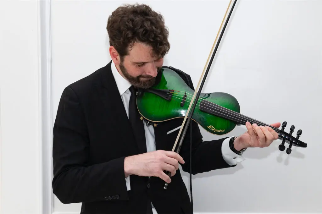 Electric violinist Zuriel Merek