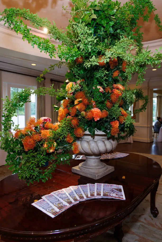 In Bloom's flower arrangement with  roses and nodding pin cushions made for an arty entrance statement at the Houston Center for Contemporary Craft Spring Luncheon 2024. PaperCity returned as media sponsor. (Photo by Katy Anderson) 