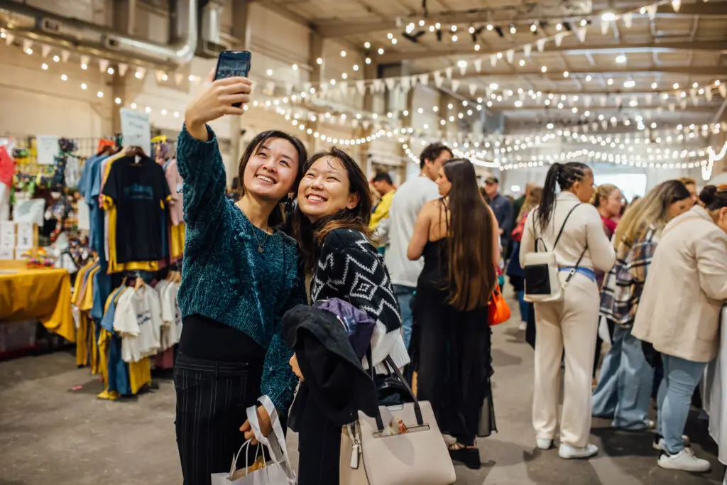 Customers taking a selfie at a Markets for Makers event (Photo by Cole LoCurto)