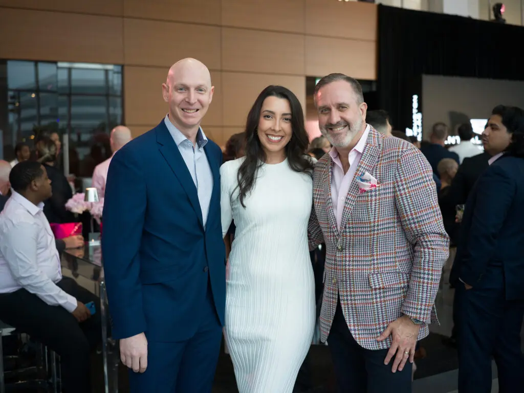 Jason Crebbin, Danielle Lomeli, Rich Losch at the grand opening of Central Houston Cadillac's new location near NRG Park (Photo by Daniel Ortiz)