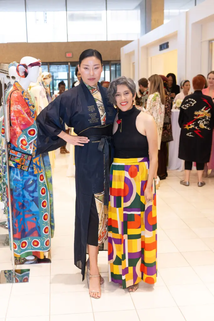 Jennifer Gabiola with model wearing her 'I AM' kimono design at Kimono Zulu fashion exhibition at Neiman Marcus (Photo by Wilson Parish)