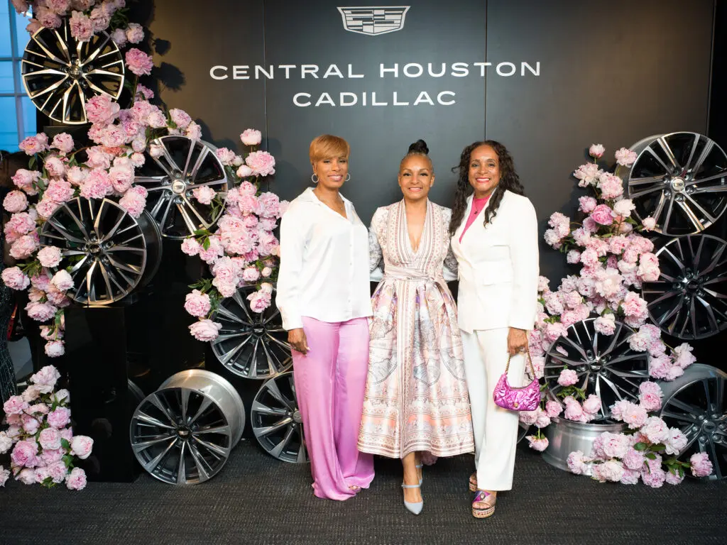 LaDonna Rucker, Veronica Wilson, Rhonda Jones at the grand opening of Central Houston Cadillac's new location near NRG Park (Photo by Daniel Ortiz)