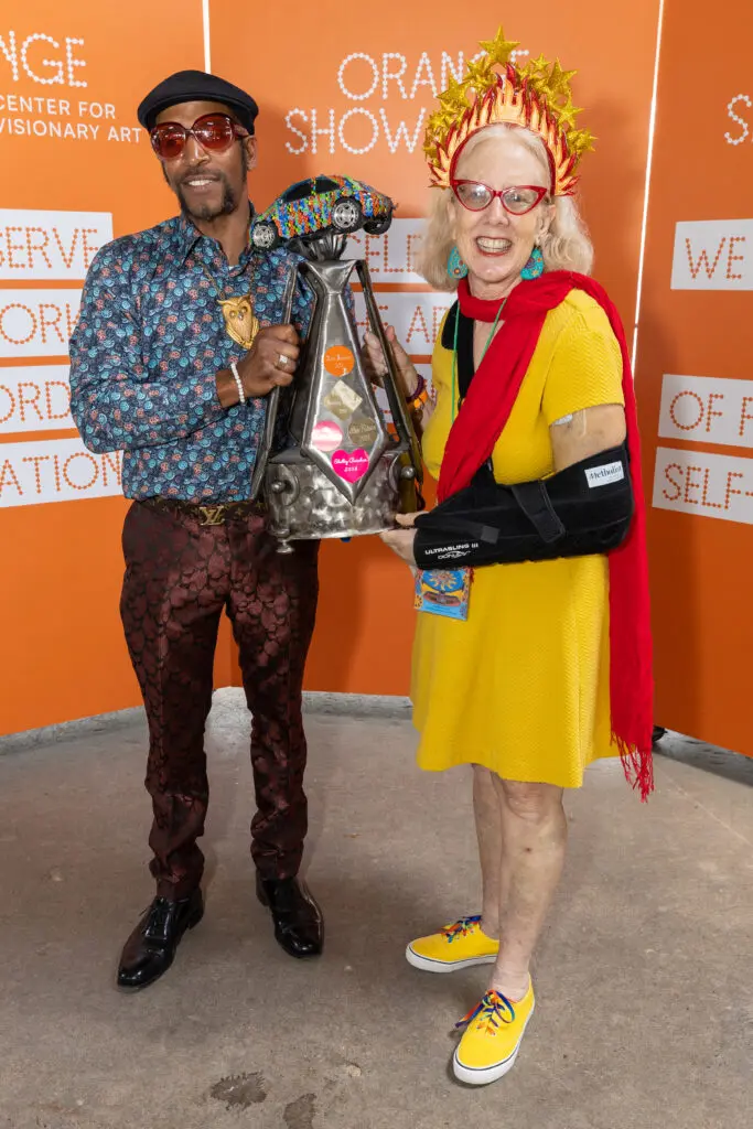 Rickey Polidore Jr., Sarah Gish attend the Orange Show's Art Car Award Ceremony. Gish won the Houston Art Car Klub's "Brother BrianBryan" award. (Photo by Emily Jaschke) 