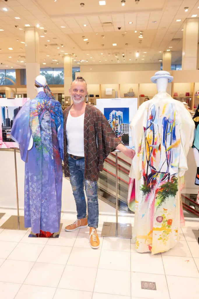 Sebastien 'Mr.D 1987' with designs 'Energy Transition' & 'Keep Your Eyes on the Road' at Kimono Zulu fashion exhibition at Neiman Marcus (Photo by Wilson Parish)