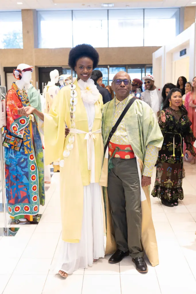Selven O'Keef Jarmon with Model wearing his 'Delphos Ascending' at Kimono Zulu fashion exhibition at Neiman Marcus (Photo by Wilson Parish)
