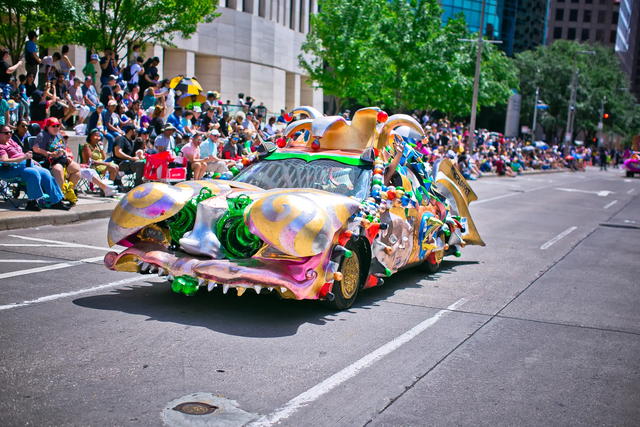 Claire & Kyle Johnson's <em>The Ploppet</em> made an impression at the Orange Show Art Car Parade (Photo by Morris Malakoff)