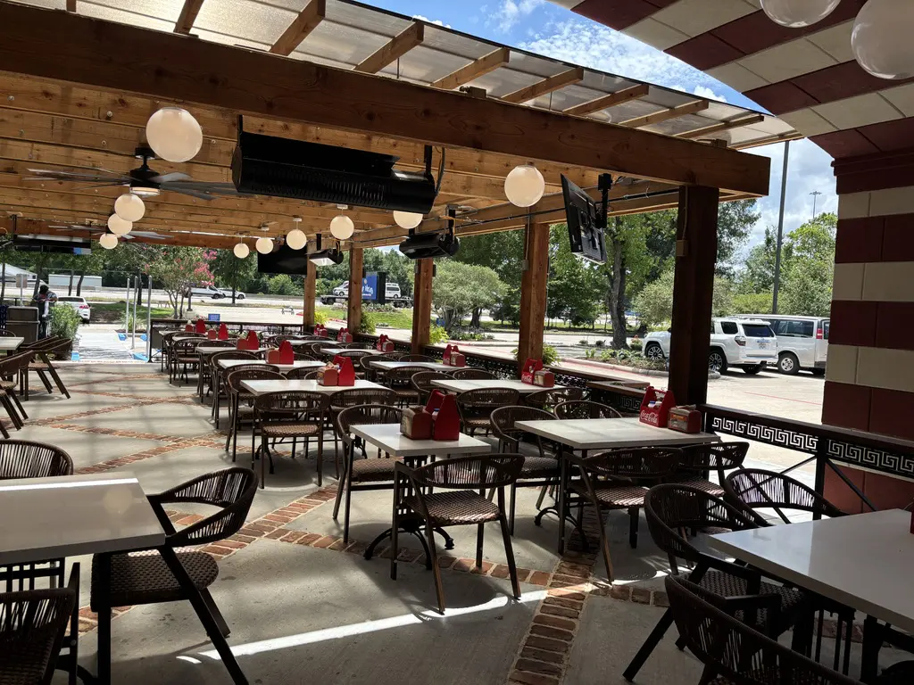The patio at the new Niko Niko's in The Woodlands seats 100, and has a small outdoor greenspace for games.