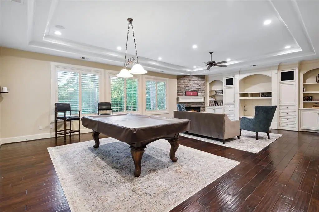 The upstairs game room at this Grogan's Point mansion is a family funhouse.