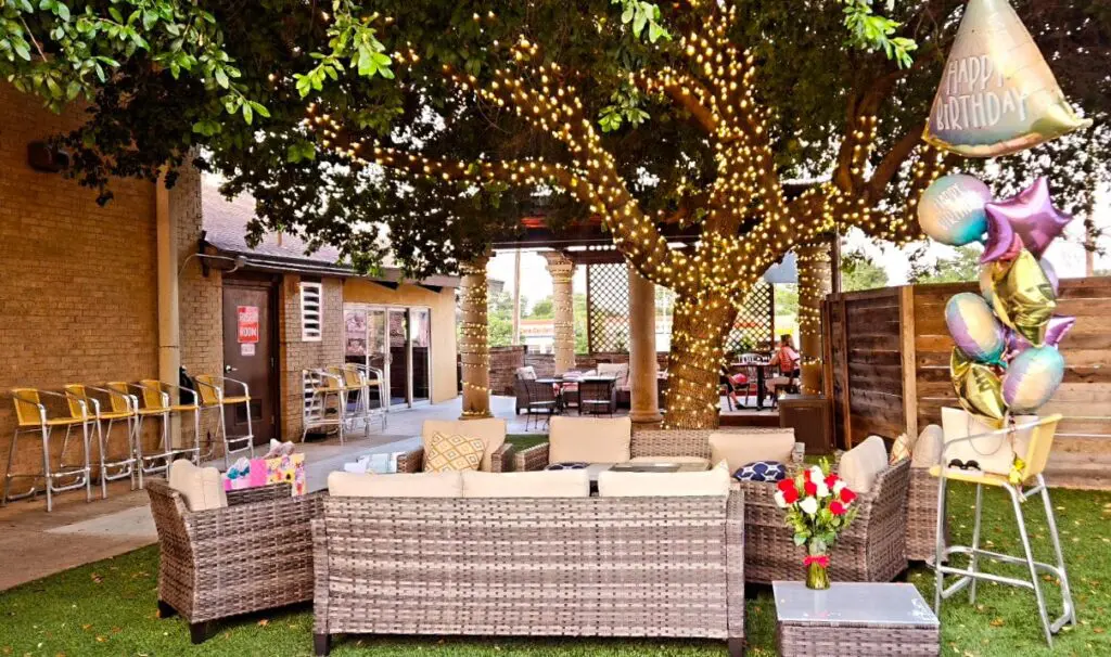 The shady patio and outdoor area at Three Barrels in Grapevine.