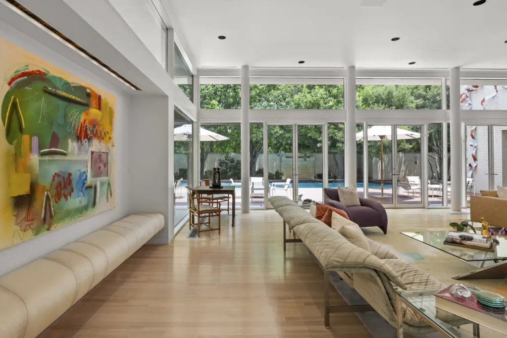  Blond woods and a view to the private poolside oasis beyond at 3950 Sarita Park Court.