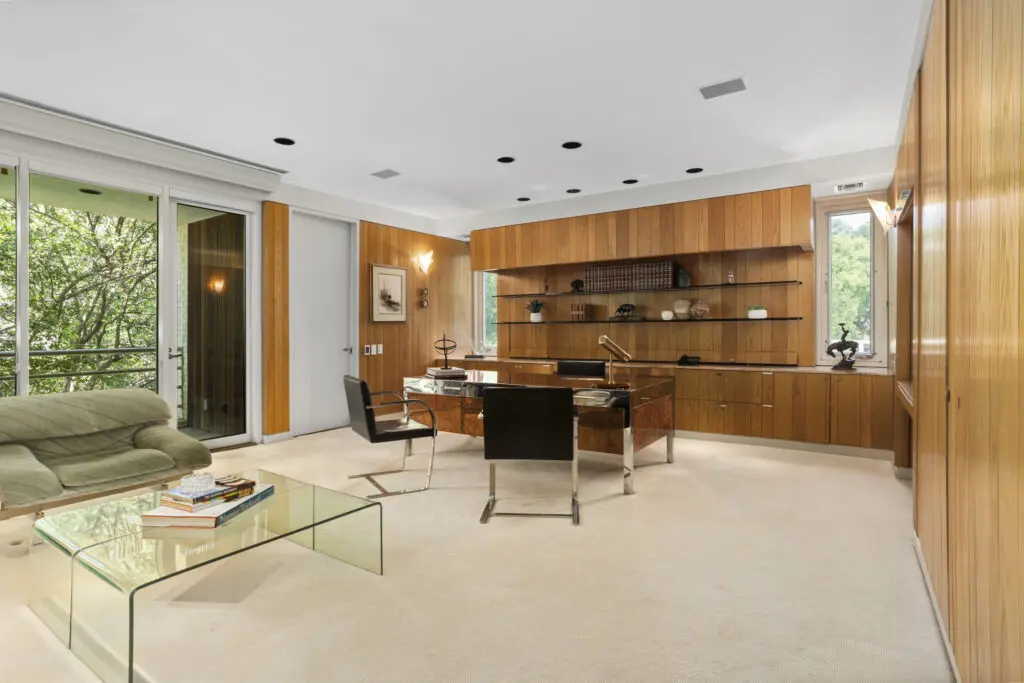 Wooden built-ins inside 3950 Sarita Park Court's grand home office.