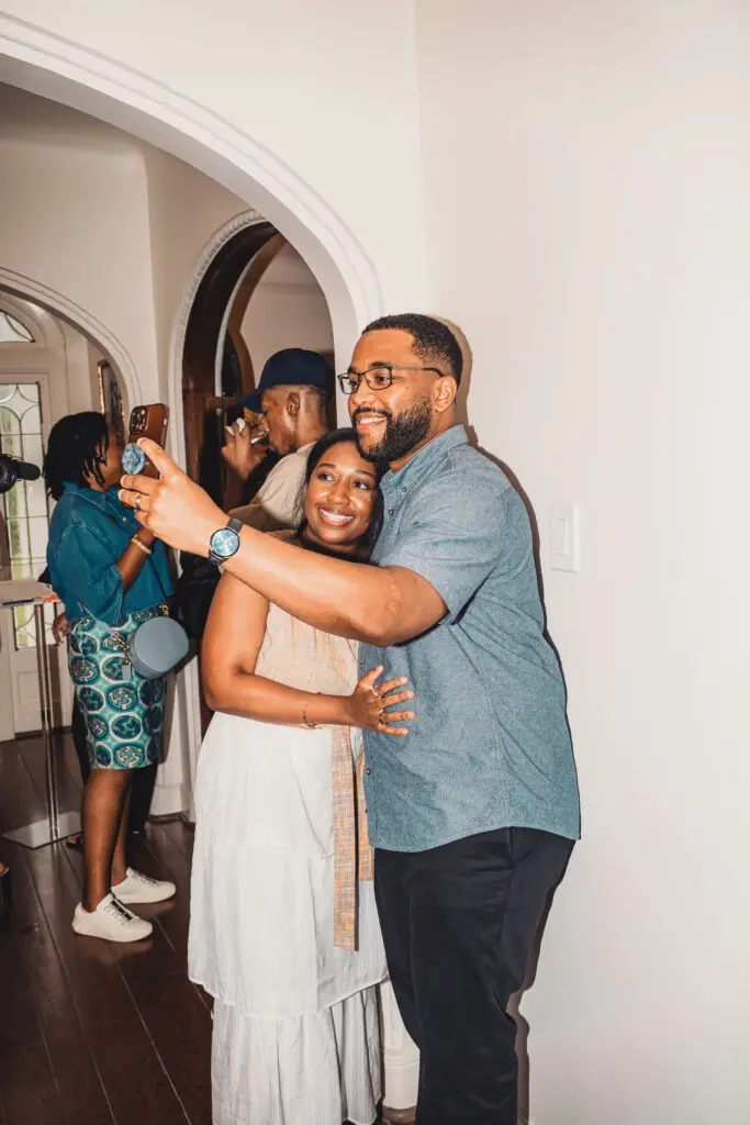 Lonez Scents' Malik & Danielle Moss take a selfie at the Juneteenth Jubilee dinner.